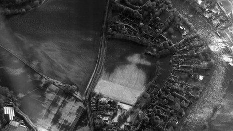 An aerial image of a flooded community taken by the RAF's Tornado jet