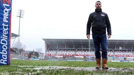 Referee Leighton Hodges carried out a pitch inspection