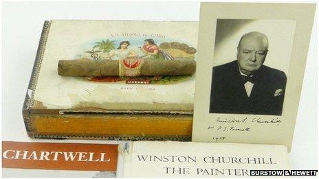 Unsmoked cigar, signed photograph and other items up for auction