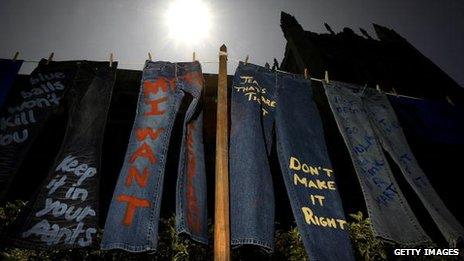 Jeans spray-painted with anti-violence messages at University Of California