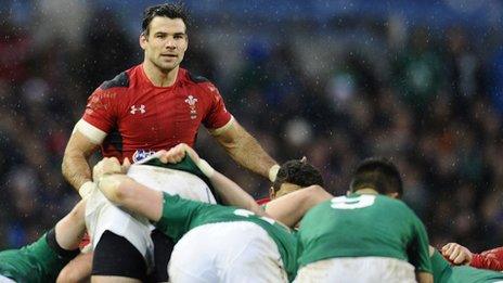 Mike Phillips looks on as Ireland's pack dominate Wales at a scrummage