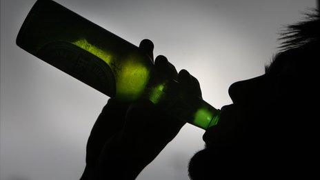 Teenager drinking beer