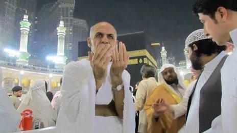 Another candidate has faced mockery over a picture showing him praying with his back to Mecca's holiest site