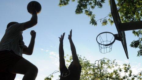 Boys play basketball