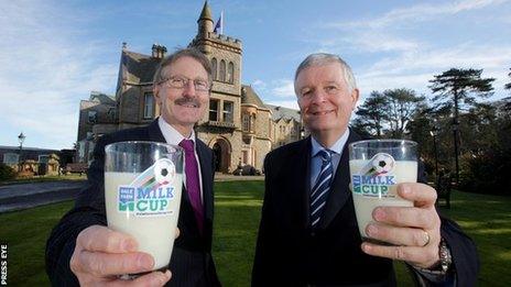 Milk Cup official Victor Leonard and David Dobbin of Dale Farm celebrate the new sponsorship deal