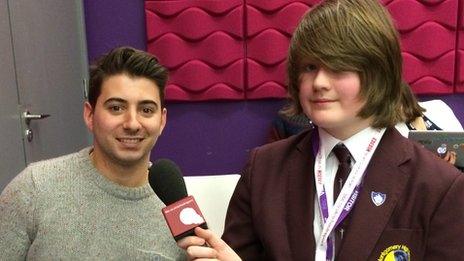 Luke from Montgomery High School interviewing Newsround presenter Ricky Boleto