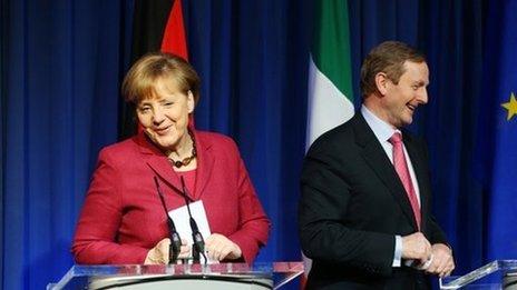 German Chancellor Angela Merkel and Irish Prime Minister Enda Kenny smile during a news conference in Government Buildings in Dublin