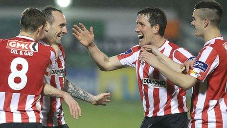 Derry goalscorer Mark Stewart is congratulated by team-mates