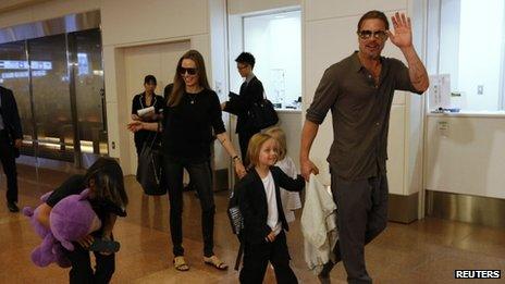 Angelina Jolie and Brad Pitt with their children