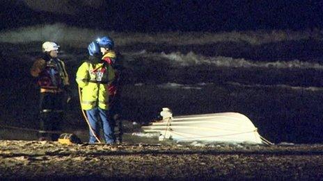 Capsized speed boat