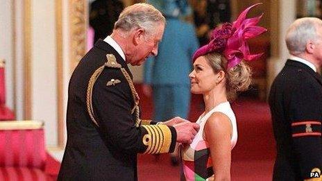 Katherine Jenkins collects her OBE from Prince Charles