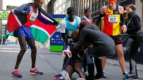 Mo Farah collapses after crossing finish line