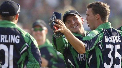 Niall O'Brien congratulates Ireland bowler Andy McBrine after he takes a wicket