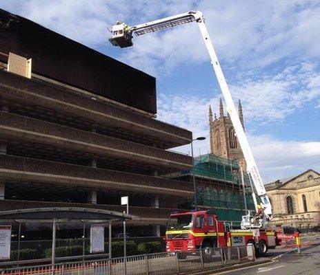 Aerial ladder platform at Derby's Assembly Rooms inspecting fire damage