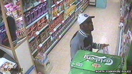 CCTV image of man in Co-op