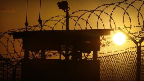 The sun rises above Camp Delta at Guantanamo Bay Naval Base, Cuba, November 20, 2013