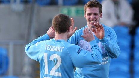 Ally Teggart congratulates Ballymena United scorer Darren Boyce