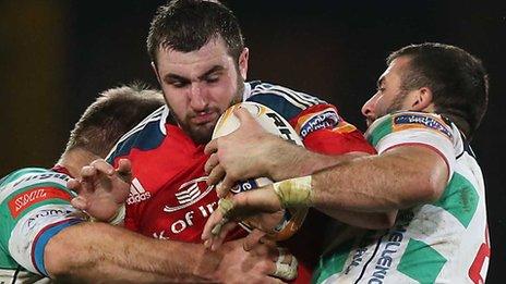 Munster's James Cronin attempts to find a way through against Treviso