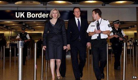 David Cameron with Theresa May at a Border Agency visit in 2010