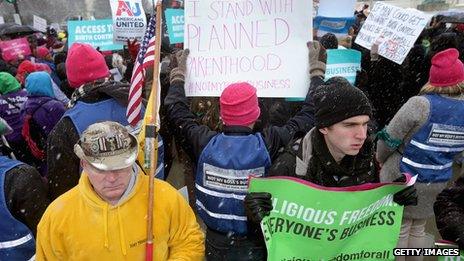 Demonstrators rally outside of the US Supreme Court during oral arguments in Sebelius v Hobby Lobby 25 March, 2014 in Washington, DC.