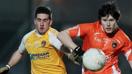 Antrim's Ryan Murray in action against Joe McElroy of Armagh