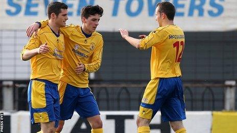 Goalscorer Gary Liggett is congratulated