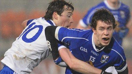 Monaghan's Killian Cromwell in action against Dara McVetty of Cavan