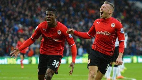 Wilfried Zaha and Craig Bellamy celebrate a Cardiff City goal