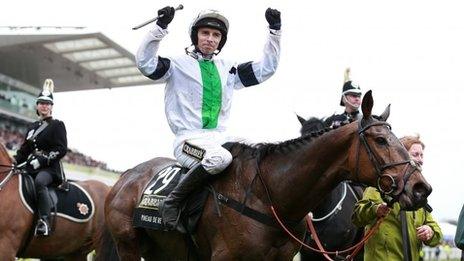 Leighton Aspell celebrates winning the Grand National on Pineau De Re