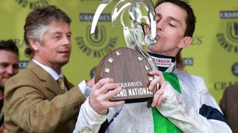 Winning jockey Leighton Aspell with the Grand National trophy