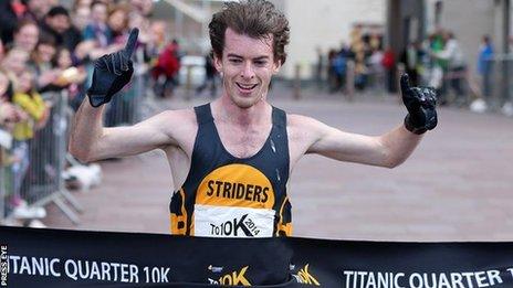 Paul Pollock celebrates at the finish line