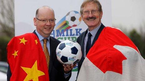 Dale Farm's Stephen Cameron and tournament chairman Victor Leonard celebrate confirmation that China and Canada will compete in the Milk Cup