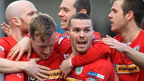 Cliftonville celebrated a 2-0 home win over Glentoran