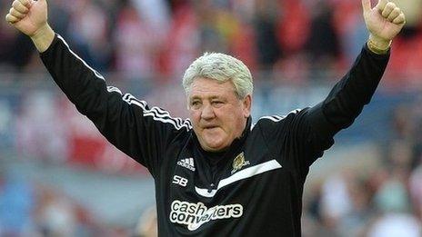 Manager Steve Bruce celebrates Hull's FA Cup win