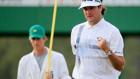 Bubba Watson gets his green jacket from Adam Scott