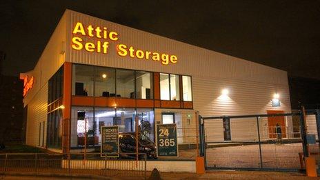 A self-storage unit at night