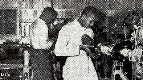 Boys work repairing shoes