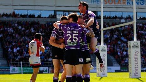 Wigan celebrate a try at St Helens