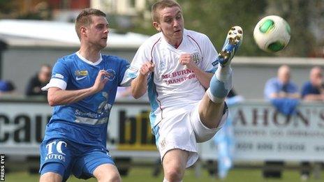 Ballinamallard's Liam McMenamin puts pressure on Alan Teggart