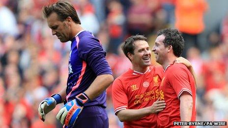 Robbie Fowler (right) celebrates with Michael Owen after scoring