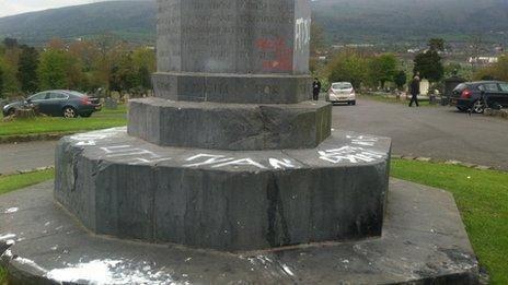 A "Cross of Sacrifice" war memorial was extensively covered in graffiti