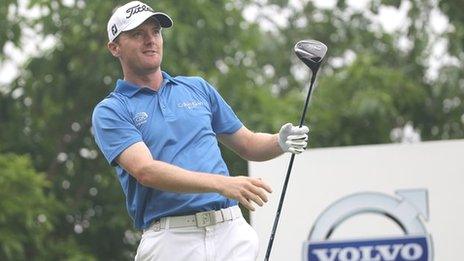 Michael Hoey watches a drive during the first round at the China Open