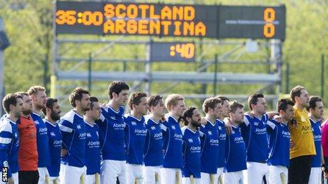 The Scotland players line up before the match against Argentina