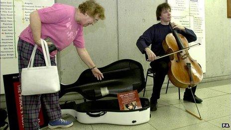 Julian Lloyd Webber performs at Westminster station
