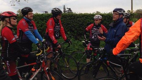 Nick Robinson interviewing cyclists in Wrexham