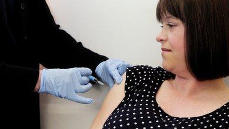 Pregnant woman being given whooping cough vaccine