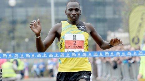 Kipsang crosses the line to win the 2013 Belfast Marathon