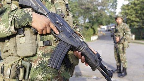 Colombian soldiers stand guard, February 6, 2014.