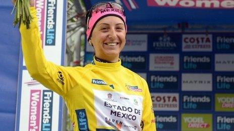 Rossella Ratto celebrates with the race leader's yellow jersey