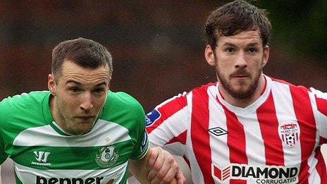 Karl Sheppard of Shamrock Rovers in action against Derry's Ryan McBride.